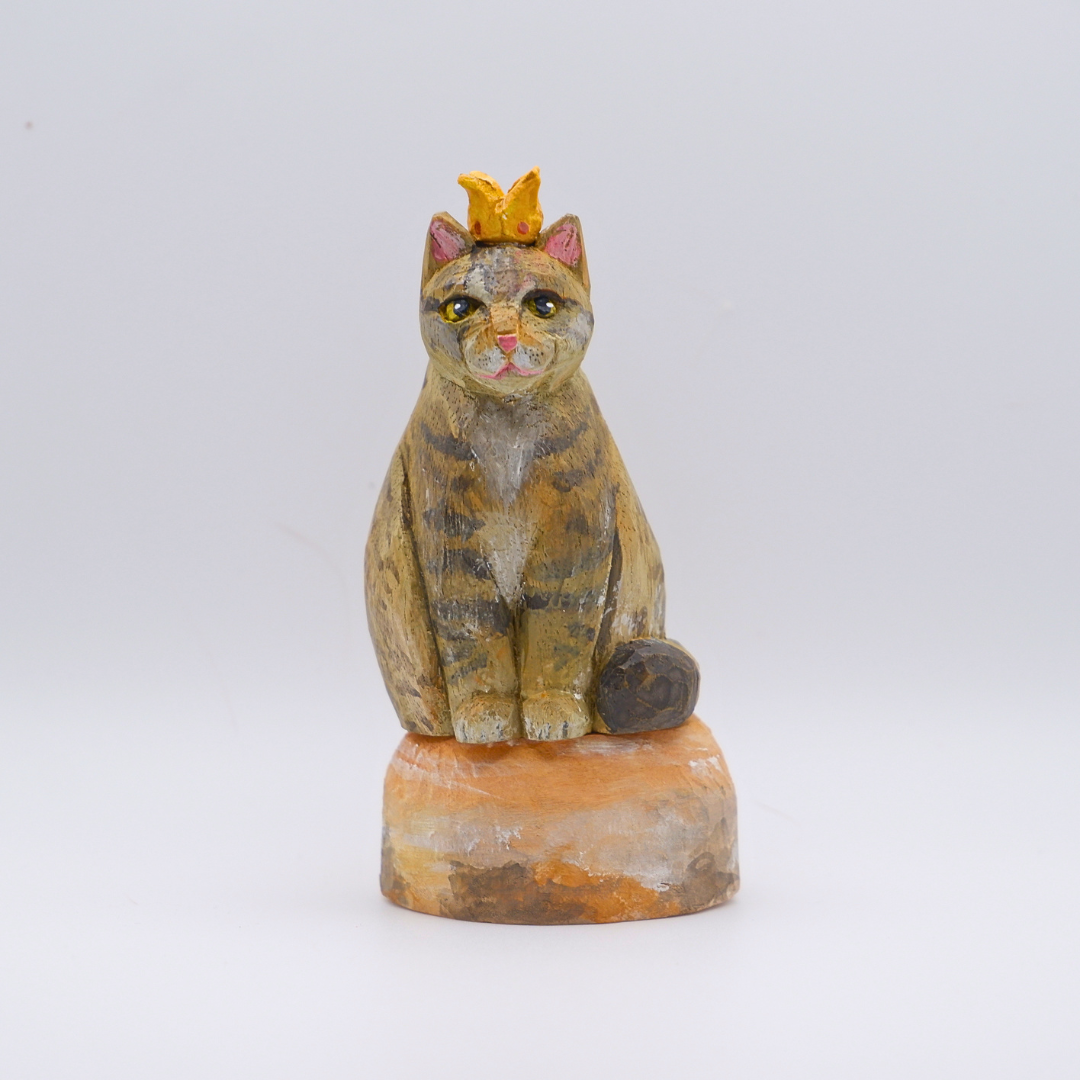 Hand-carved wooden Tabby cat figurine with gold crown on painted Venus planet base by anornament