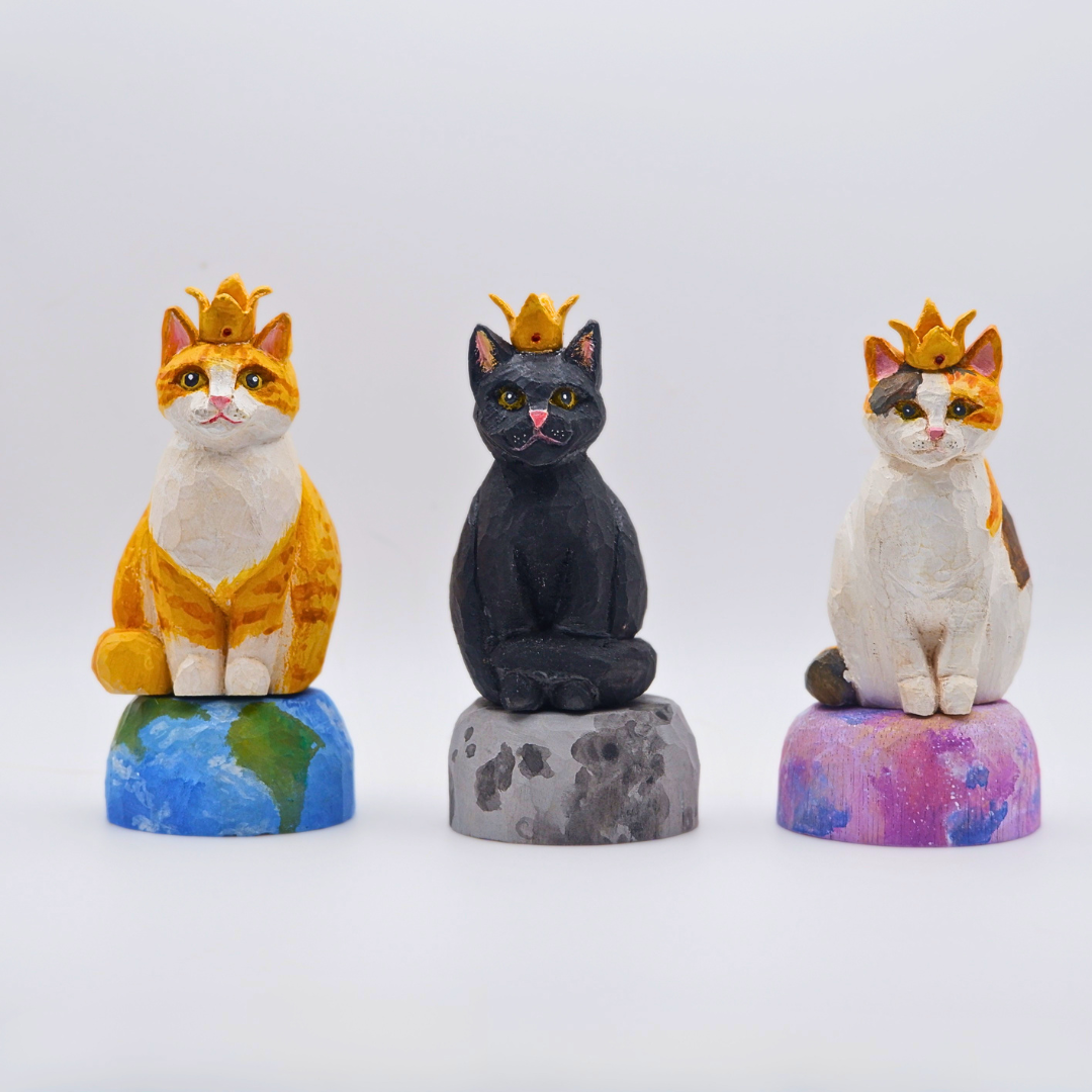 Hand-carved wooden Ginger, Blacky and Calico cat figurines on painted planet bases by anornament