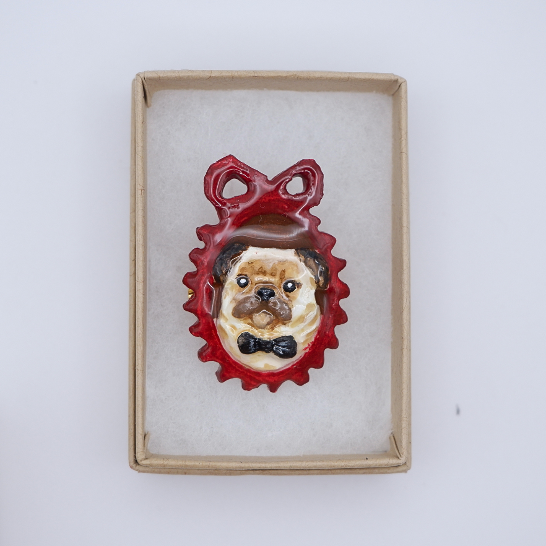Hand-crafted Pug brooch in red cameo frame by anornament, presented in gift box