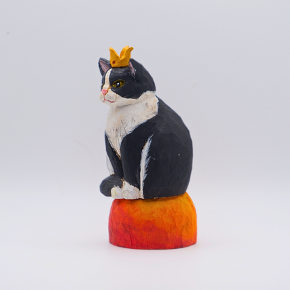 Hand-carved wooden Tuxedo cat figurine with gold crown on painted Mars planet base by anornament