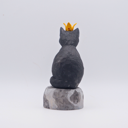Hand-carved wooden black cat figurine with gold crown seated on painted Moon base by anornament