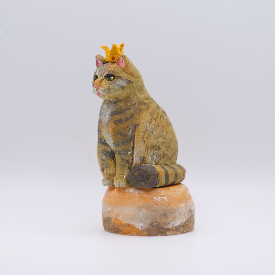 Hand-carved wooden Tabby cat figurine with gold crown on painted Venus planet base by anornament